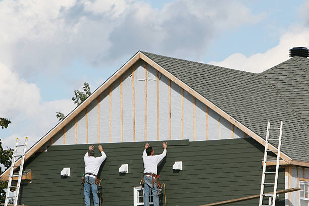 Professional Siding technician working in Rock Hill, NY